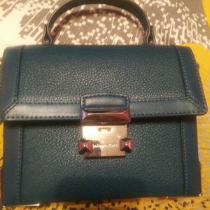 Blue Michael Kors mini suitcase crossbody